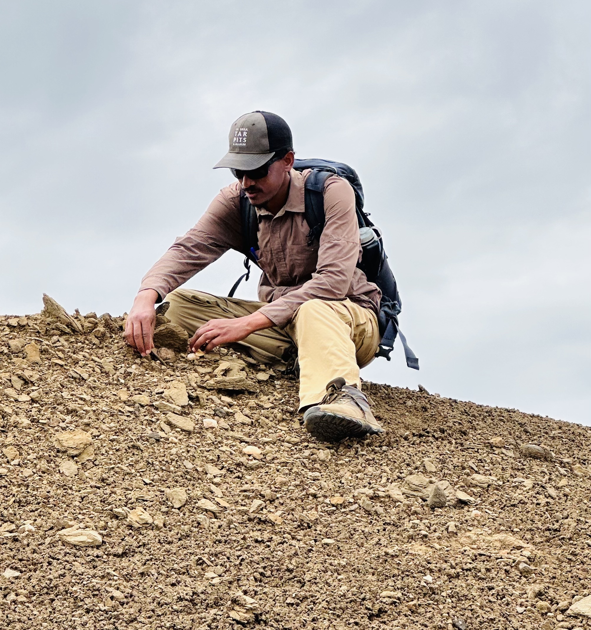 This image shows Niguss Baraki working in the field