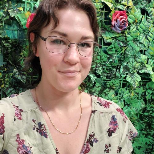 photo of  person in front of a green background