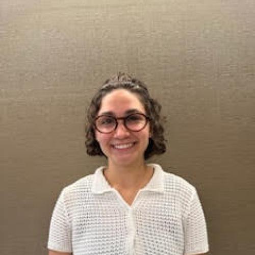 photo of Undergraduate Student Sophia Andrews in front of a wall