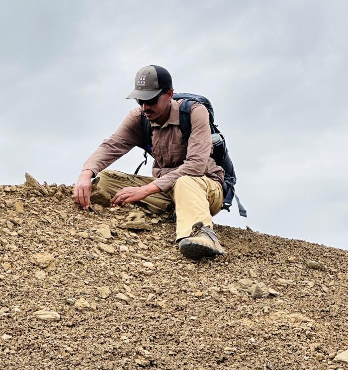 This image shows Niguss Baraki working in the field